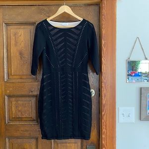 Calvin Klein black knit dress with geo cutouts